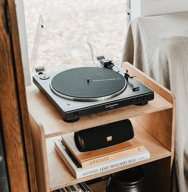 vintage but modern and neat record player on a bedside table